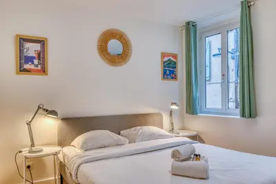 Un ou plusieurs lits dans un hébergement de l'établissement Le Spinoza - T3 portes de Lyon - Sainte-Foy - WiFi inclus
