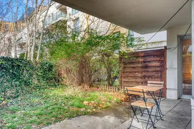Jardin de l'établissement LAtmosphère Agréable T2 avec terrasse 2 pers Tram T5
