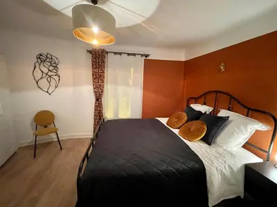 Un ou plusieurs lits dans un hébergement de l'établissement Cocooning aux portes de Lyon Wifi - Netflix