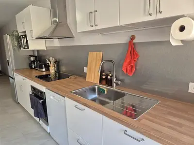 Cuisine ou kitchenette dans l'établissement Séjour au cœur des Pierres Dorées