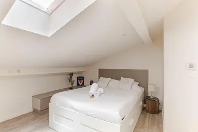 Un ou plusieurs lits dans un hébergement de l'établissement Cozy and charming accommodation Lyon 1 center