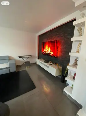 Coin salon dans l'établissement Appartement climatisé premier étage Lyon Bron Eurexpo