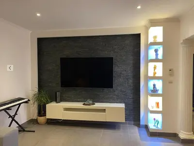 Télévision ou salle de divertissement dans l'établissement Appartement climatisé premier étage Lyon Bron Eurexpo