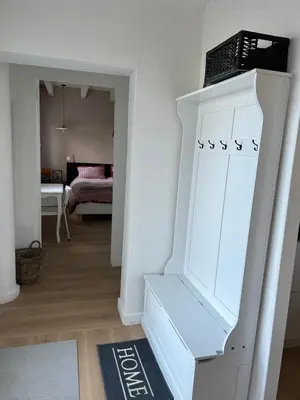 Un ou plusieurs lits dans un hébergement de l'établissement Le Cottage