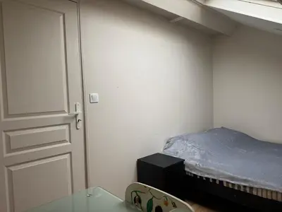 Un ou plusieurs lits dans un hébergement de l'établissement T2 Apartment