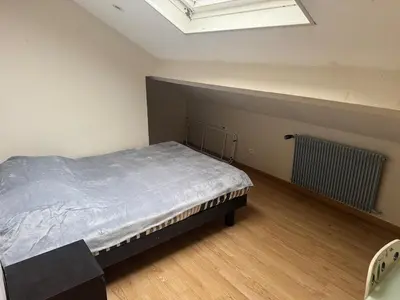 Un ou plusieurs lits dans un hébergement de l'établissement T2 Apartment