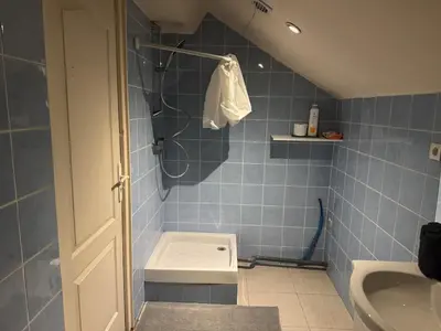 Salle de bains dans l'établissement T2 Apartment