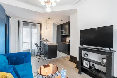 Télévision ou salle de divertissement dans l'établissement Appartement Majorel - Welkeys