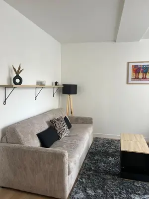 Coin salon dans l'établissement C&C, calme et confort - Idéal au cœur de la ville