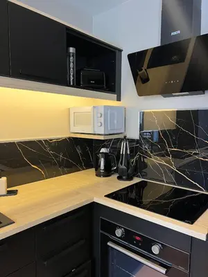 Cuisine ou kitchenette dans l'établissement C&C, calme et confort - Idéal au cœur de la ville