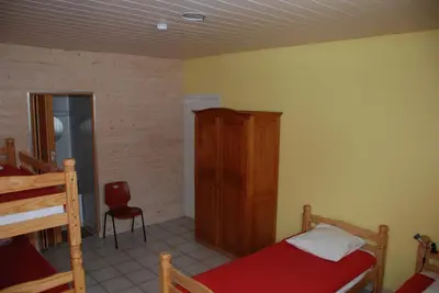 Un ou plusieurs lits dans un hébergement de l'établissement Domaine des Gardette