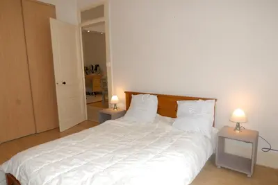 Un ou plusieurs lits dans un hébergement de l'établissement BnGo I Le Central & Cosy I 4p, Centre-ville, Balcon
