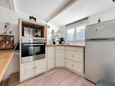 Cuisine ou kitchenette dans l'établissement L'Espérance - Gîte Sauveur - Terrasse et parking privé