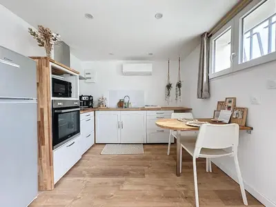 Cuisine ou kitchenette dans l'établissement Le Magnolia