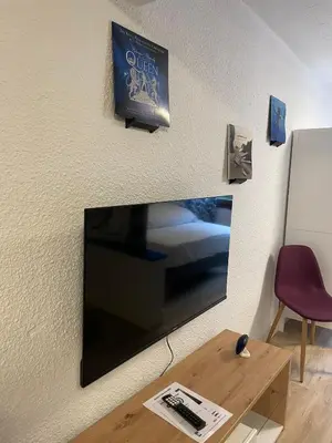 Télévision ou salle de divertissement dans l'établissement Studio Music Blue - Bourgoin Centre