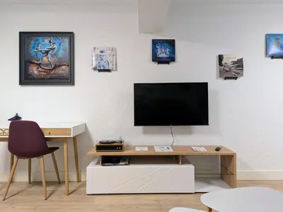Télévision ou salle de divertissement dans l'établissement Studio Music Blue - Bourgoin Centre