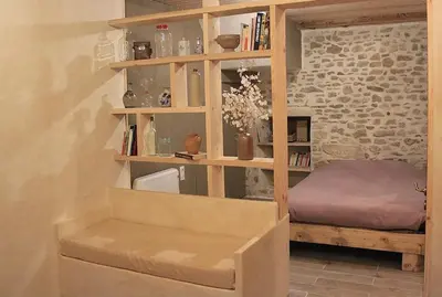 Un ou plusieurs lits dans un hébergement de l'établissement Studio rénové dans le Château des Tours