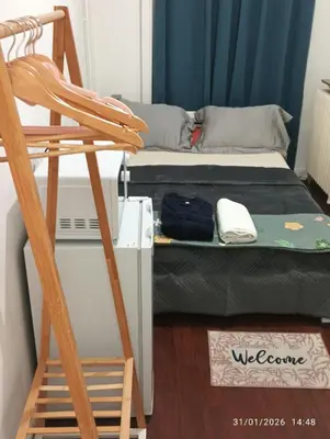 Un ou plusieurs lits dans un hébergement de l'établissement Chambre Cosy calme et appaisante