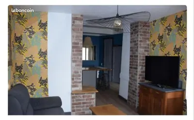 Télévision ou salle de divertissement dans l'établissement Maison Terreaux