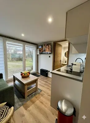 Cuisine ou kitchenette dans l'établissement Le Studio