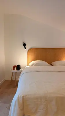 Un ou plusieurs lits dans un hébergement de l'établissement Maison entière avec 2 chambres , Jardin et parking
