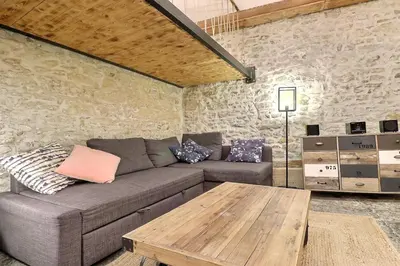 Coin salon dans l'établissement Le Sergent Spacieux et chaleureux appartement - Lyon 1er