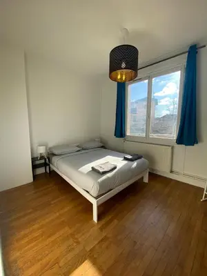 Un ou plusieurs lits dans un hébergement de l'établissement BnGo l La Pause Urbaine l 3ch, 10p