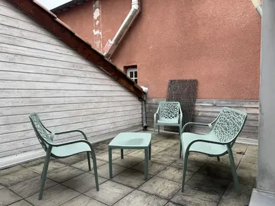 Coin salon dans l'établissement Magnifique T3 avec terrasse secteur Charpennes