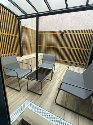 Coin salon dans l'établissement T2 cosy idéalement situé