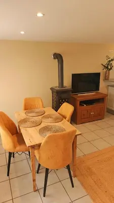 Télévision ou salle de divertissement dans l'établissement L'orée du vignoble