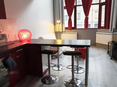 Cuisine ou kitchenette dans l'établissement L Esprit Loft, Duplex pour 4 proche Lyon et PartDieu