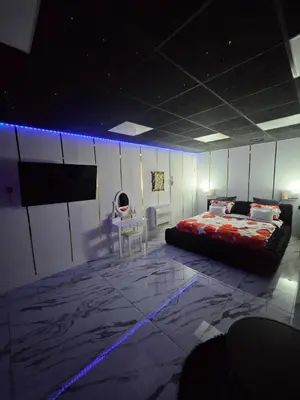 Un ou plusieurs lits dans un hébergement de l'établissement Love Room
