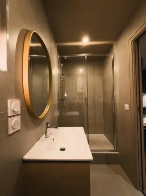 Salle de bains dans l'établissement Le Nid Douillet des Traboules - Centre ville