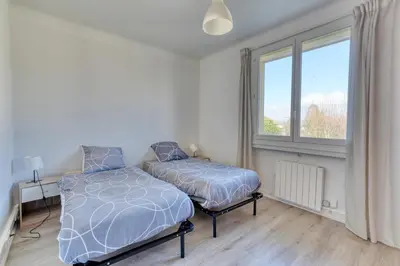 Un ou plusieurs lits dans un hébergement de l'établissement Le Grand Refuge - Terrasse Privée - Jonage