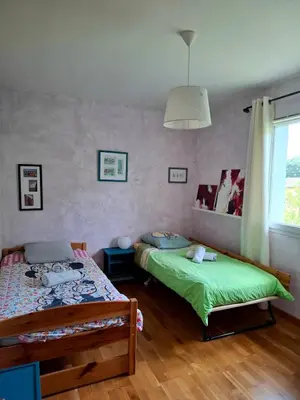 Un ou plusieurs lits dans un hébergement de l'établissement Maison Horizon