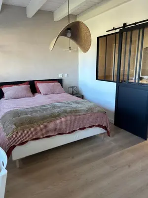 Un ou plusieurs lits dans un hébergement de l'établissement Le Cottage