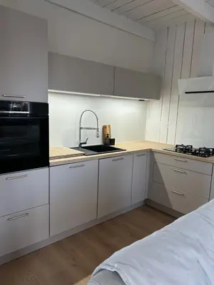 Cuisine ou kitchenette dans l'établissement Le Cottage