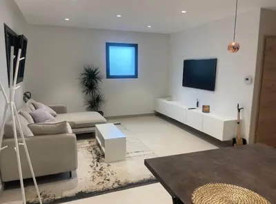 Télévision ou salle de divertissement dans l'établissement Villa Adam