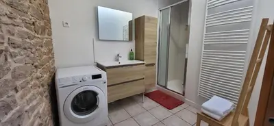Salle de bains dans l'établissement L'instant doré