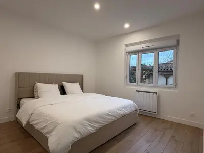 Un ou plusieurs lits dans un hébergement de l'établissement Elegant apartment
