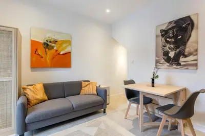 Coin salon dans l'établissement Exceptional Apartment - Terrace 2P Oullins