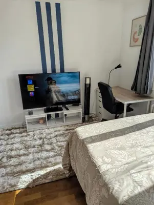 Télévision ou salle de divertissement dans l'établissement Chambre