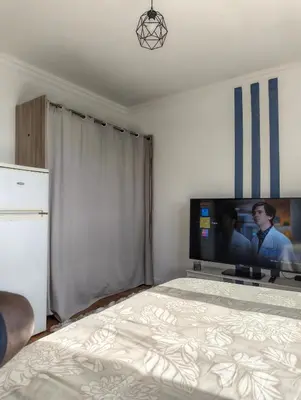 Télévision ou salle de divertissement dans l'établissement Chambre