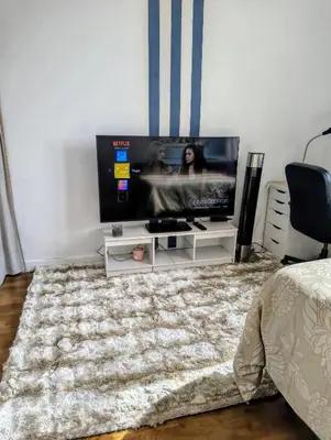Télévision ou salle de divertissement dans l'établissement Chambre