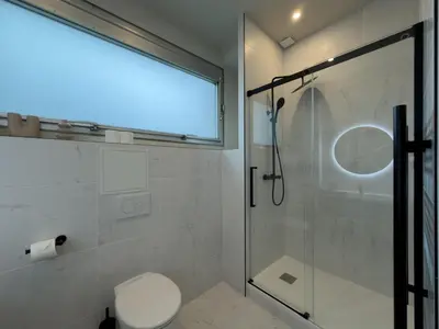 Salle de bains dans l'établissement Le Rhône - Aux Charmes Lyonnais '