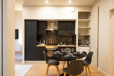 Cuisine ou kitchenette dans l'établissement Le Presqu'île - Escapade Lyonnaise