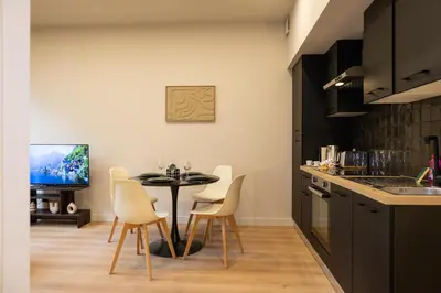 Cuisine ou kitchenette dans l'établissement Le Saint Jean - Signature Urbaine élégante