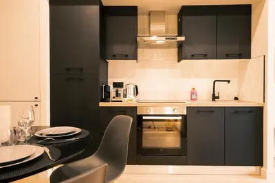 Cuisine ou kitchenette dans l'établissement Le Bellecour - L'instant Lyonnais