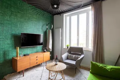 Télévision ou salle de divertissement dans l'établissement DIFY Art Déco - Charpennes