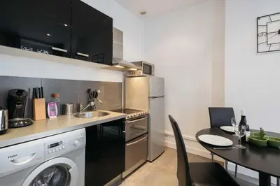 Cuisine ou kitchenette dans l'établissement DIFY Glamour - Masséna